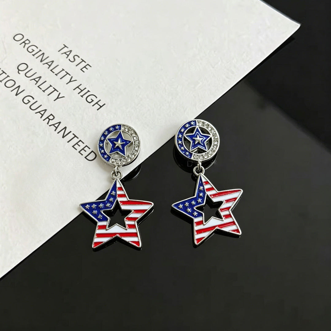 Ladies hanging earrings with star pendant and enamel flag motif Kalsten