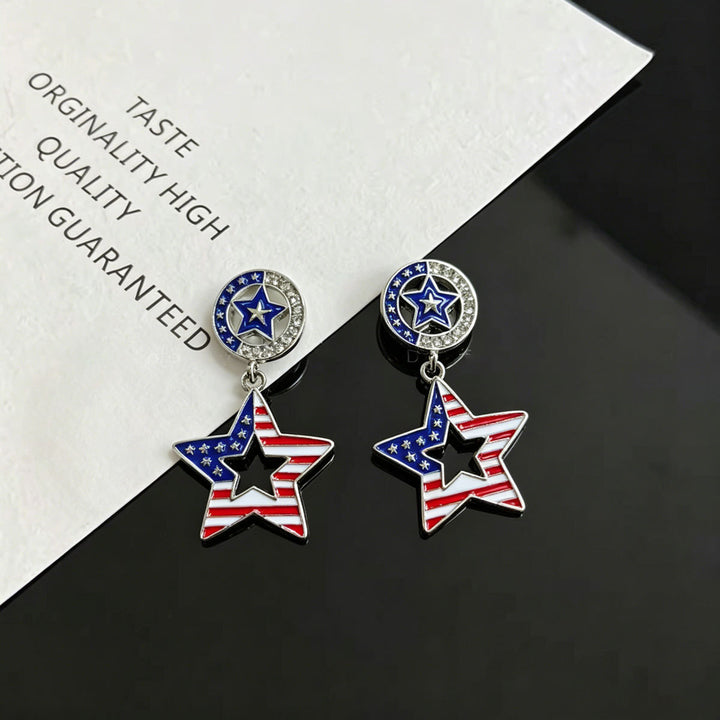Ladies hanging earrings with star pendant and enamel flag motif Kalsten