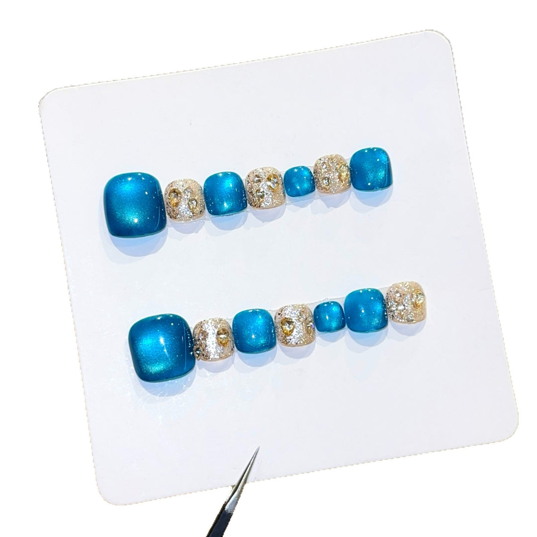 Art Nail Design with Shimmering Accents and Sparkling Rhinestone Details Kalsten