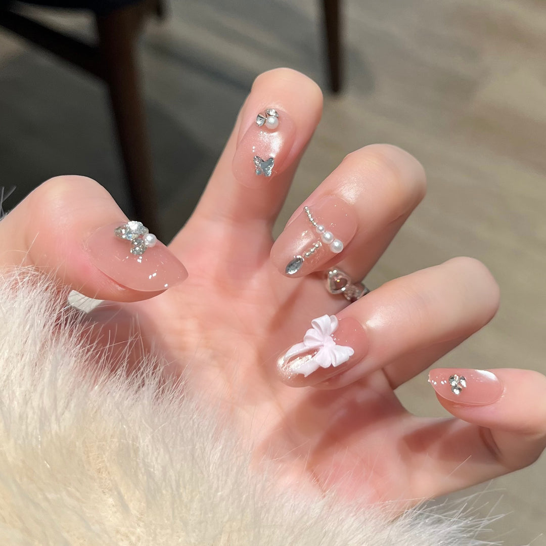 Elegant Nail Art Extensions with Pearl Accents Kalsten