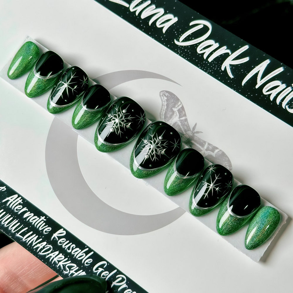 Glamorous artificial nails with intricate Christmas design Kalsten