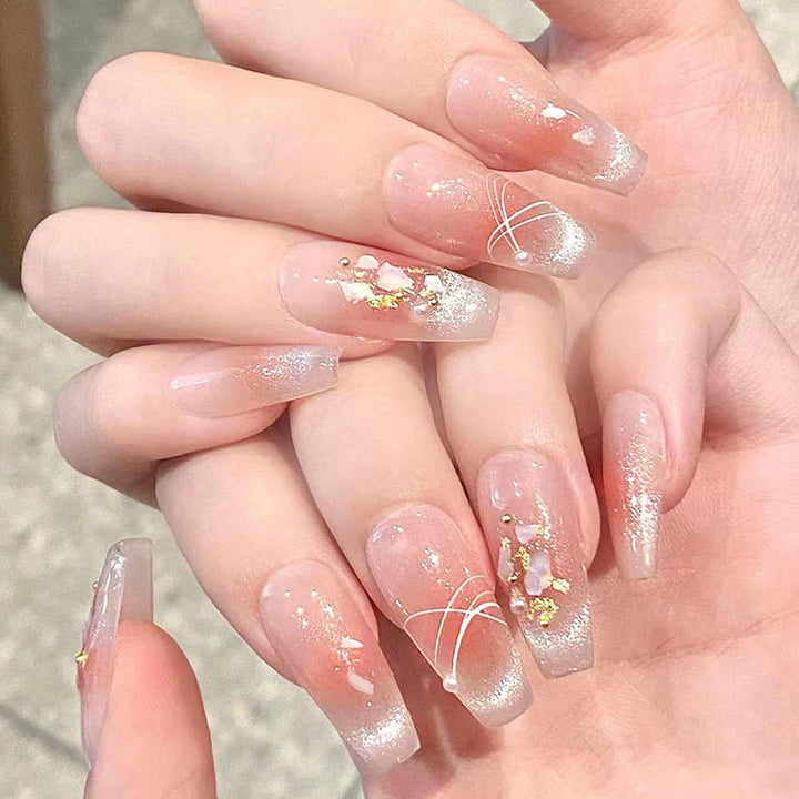 Artificial nail set with elegant glitter and flower decorations Kalsten