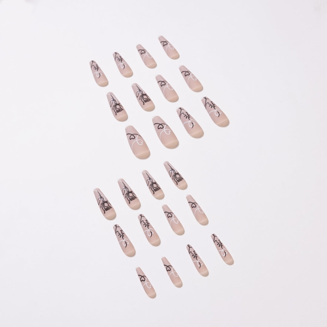 Artful nail extensions with creative line and heart design Kalsten