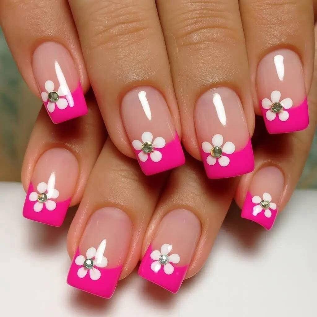 Spring-like nail art with flower appliqués Kalsten