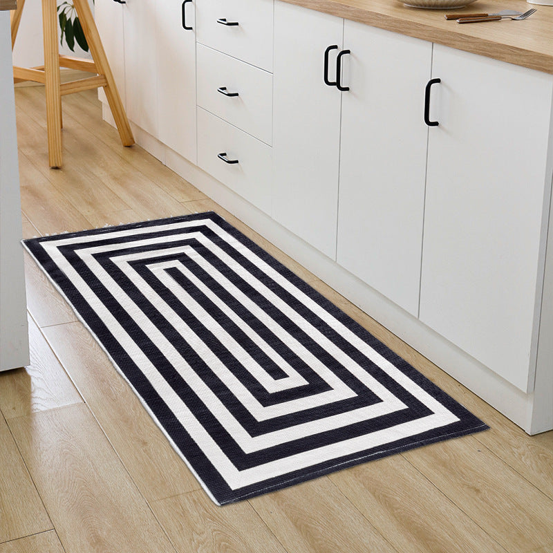 Woven cotton blend bath mat in buffalo check with flat weave structure Kalsten
