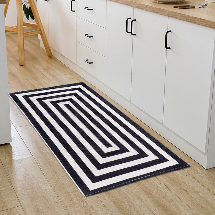 Woven cotton blend bath mat in buffalo check with flat weave structure Kalsten