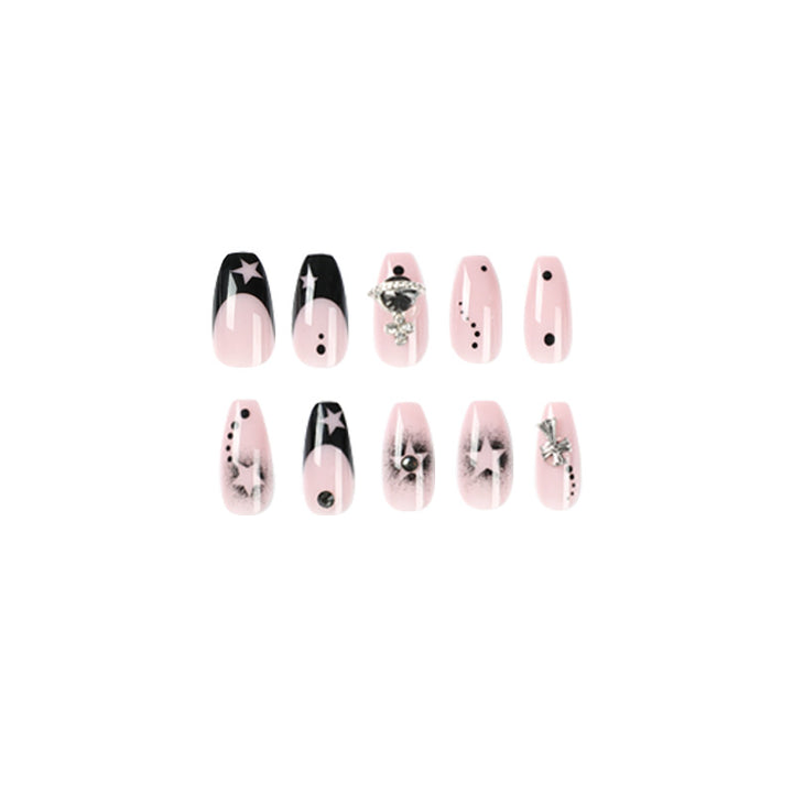 Glamorous nail art with star motifs and glitter accents Kalsten
