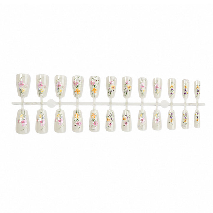 Artificial nail set with floral embellishments and glamorous details Kalsten