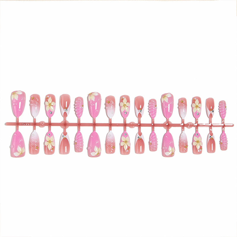 Nail art set with filigree flower patterns and sparkling accents Kalsten