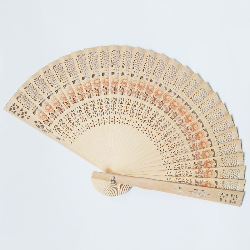 Ladies fan made of delicate plastic with artistic cut pattern Kalsten