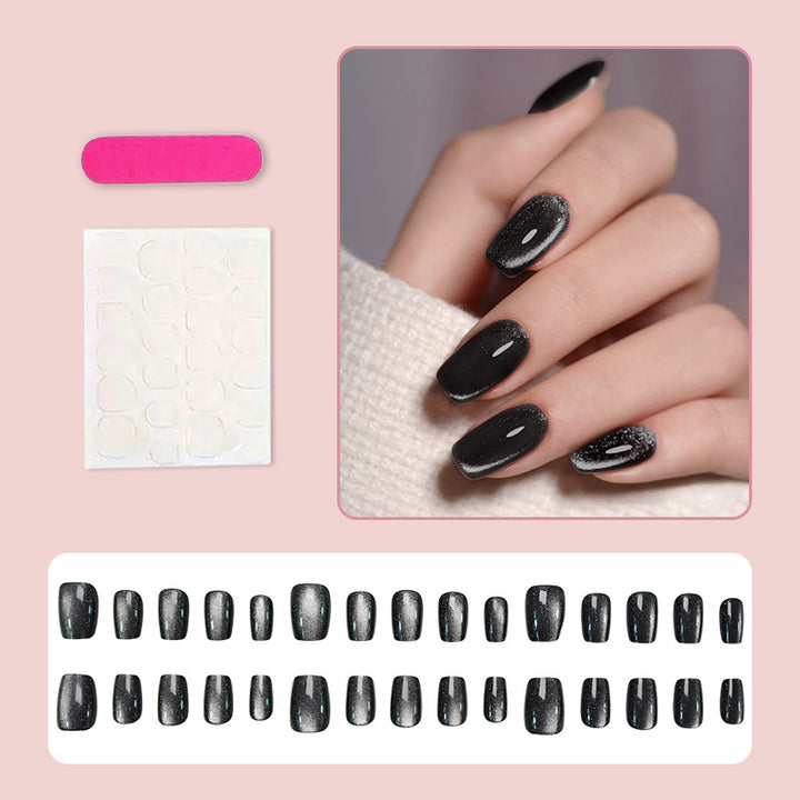 Artificial nail set with glamorous black glitter accents Kalsten