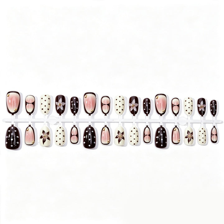 Acrylic nail set with floral accents and elegant design Kalsten