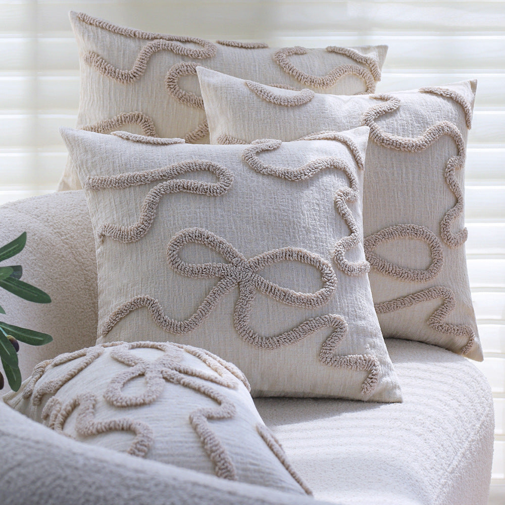 Square decorative cushion cover with hand-tufted bow and wave relief made of cotton-linen mix Kalsten