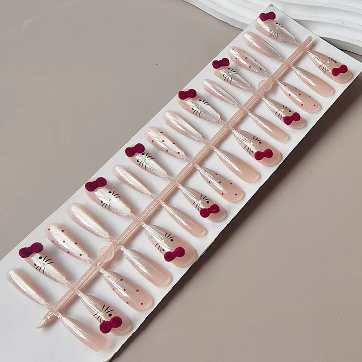 Artificial nails with playful Hello Kitty design Kalsten