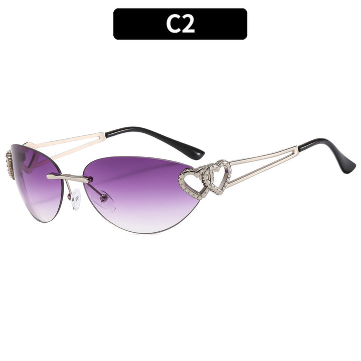 Fashion-Forward Cat-Eye Sunglasses with Heart Accents