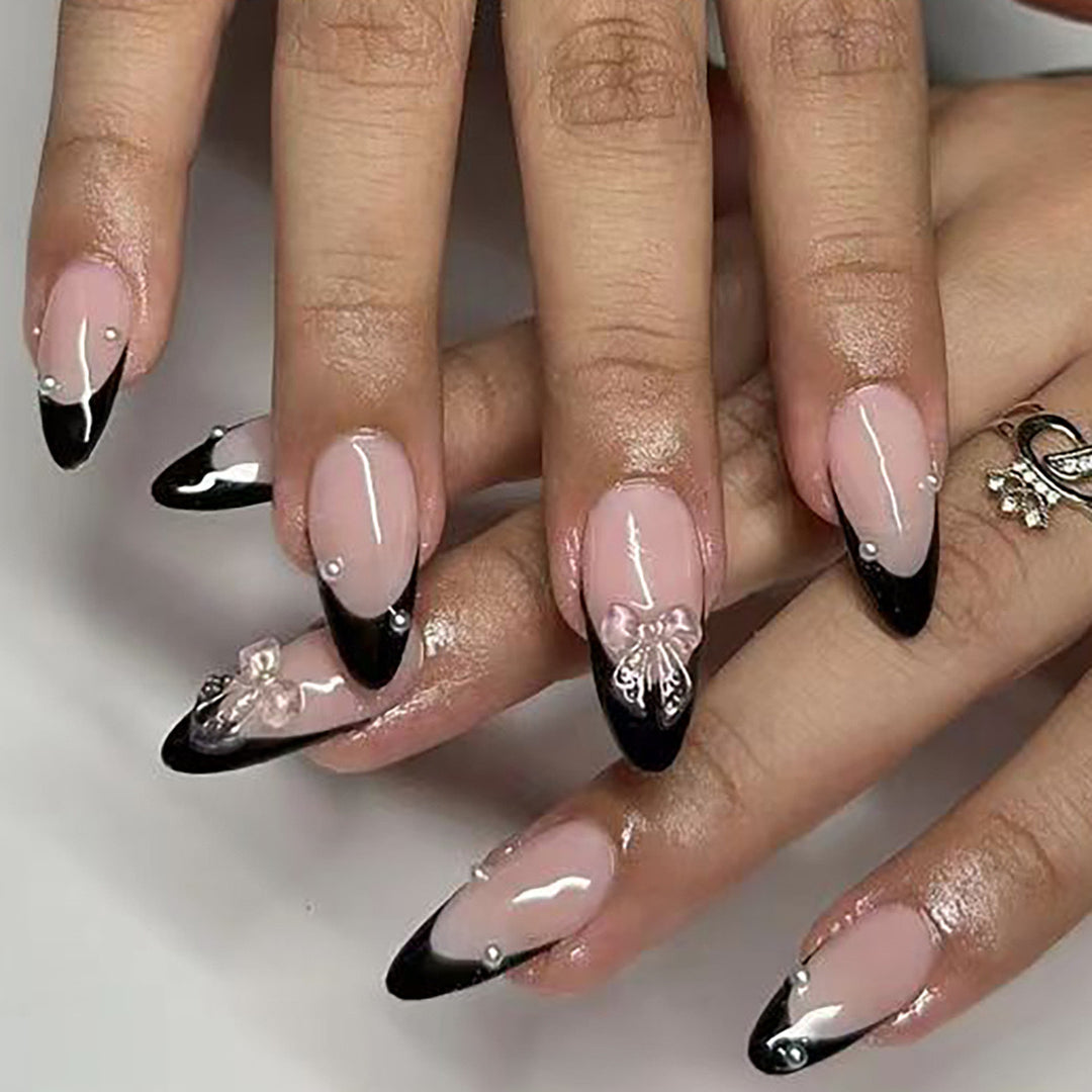 Artificial nail set with glossy French design and delicate 3D accents Kalsten