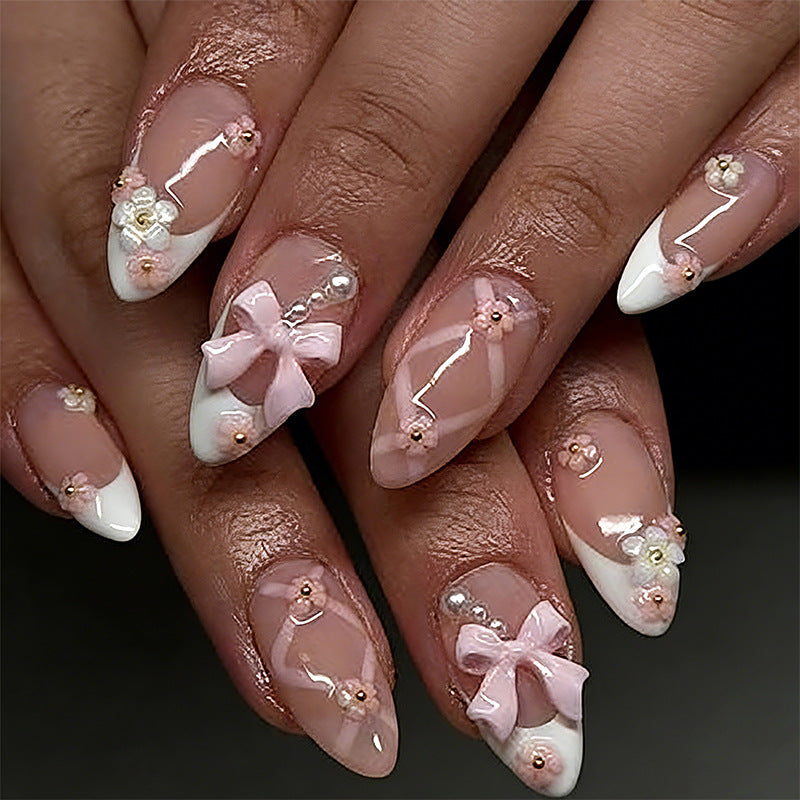 Artful Nail Tips with Ribbons and Floral Decorations Kalsten