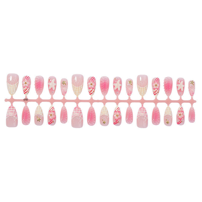 Artificial nail set with maritime shell and flower design Kalsten