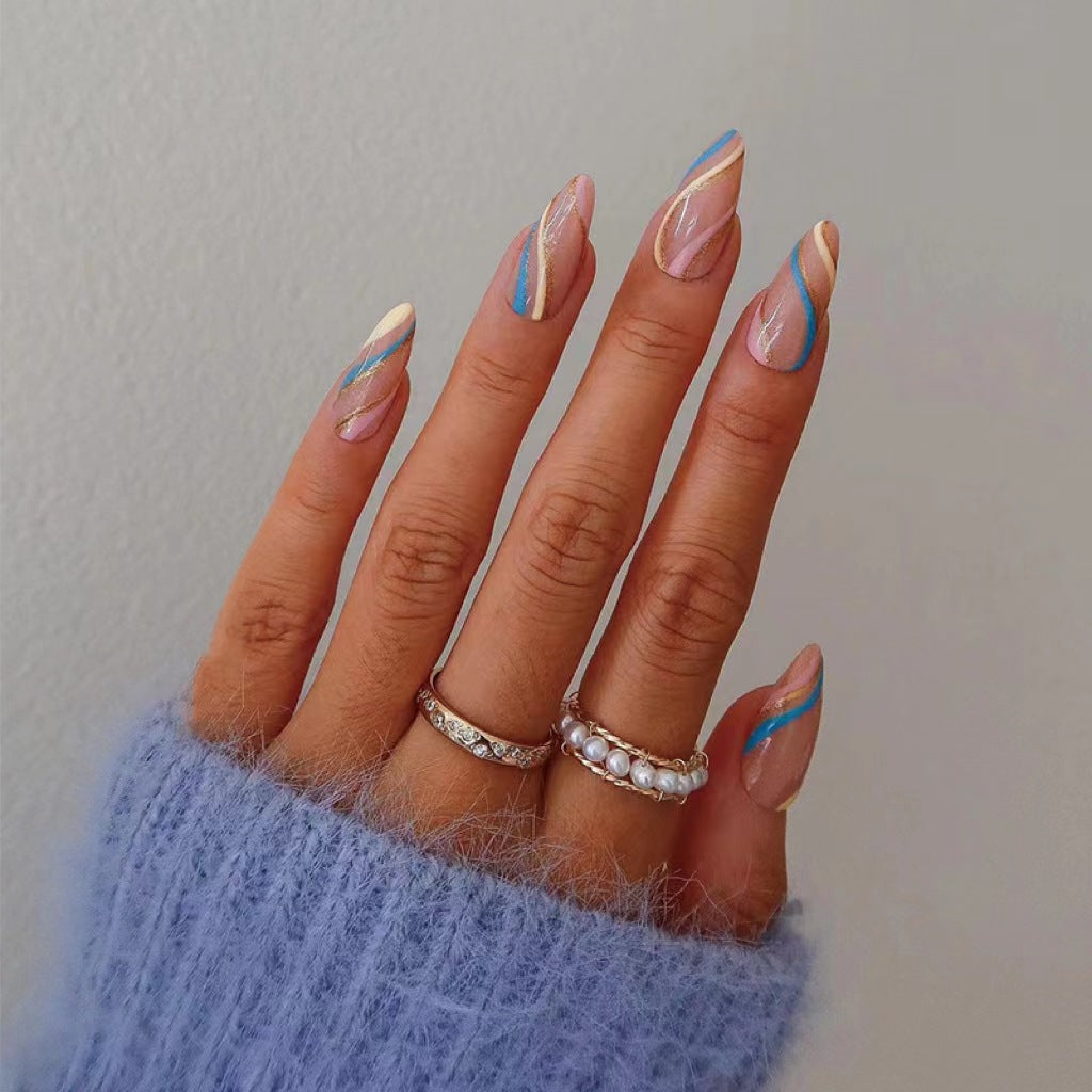 Artistic nail art with metallic accents and abstract designs Kalsten