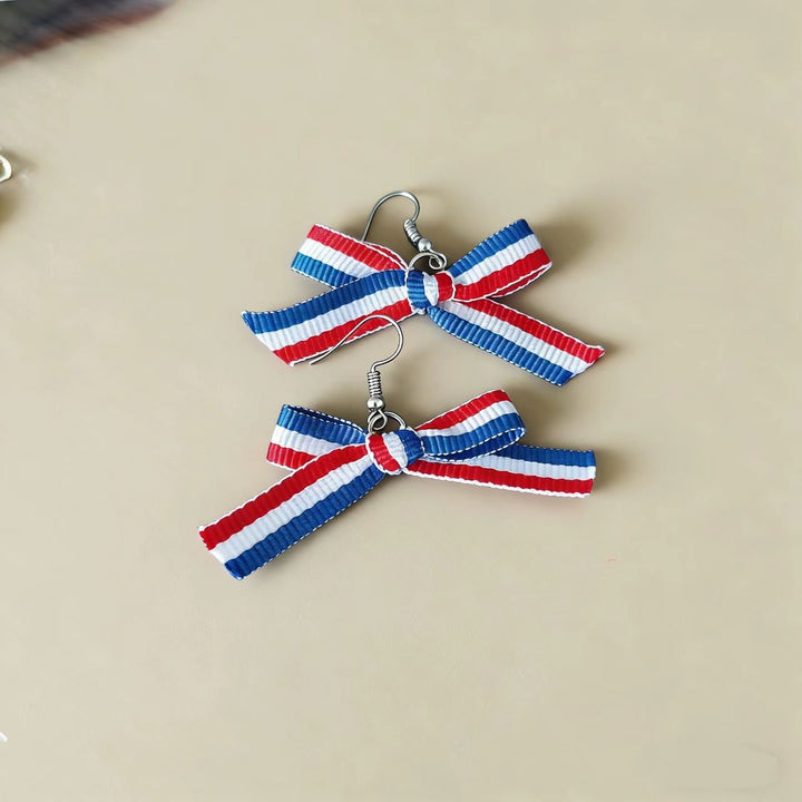 Women's handcrafted tassel earrings with flag medallion and pearl fringes Kalsten