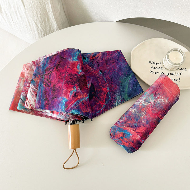 Ladies elegant folding umbrella with unique marble pattern Kalsten