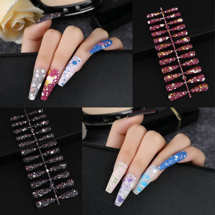Artistic splatter design artificial nails Kalsten