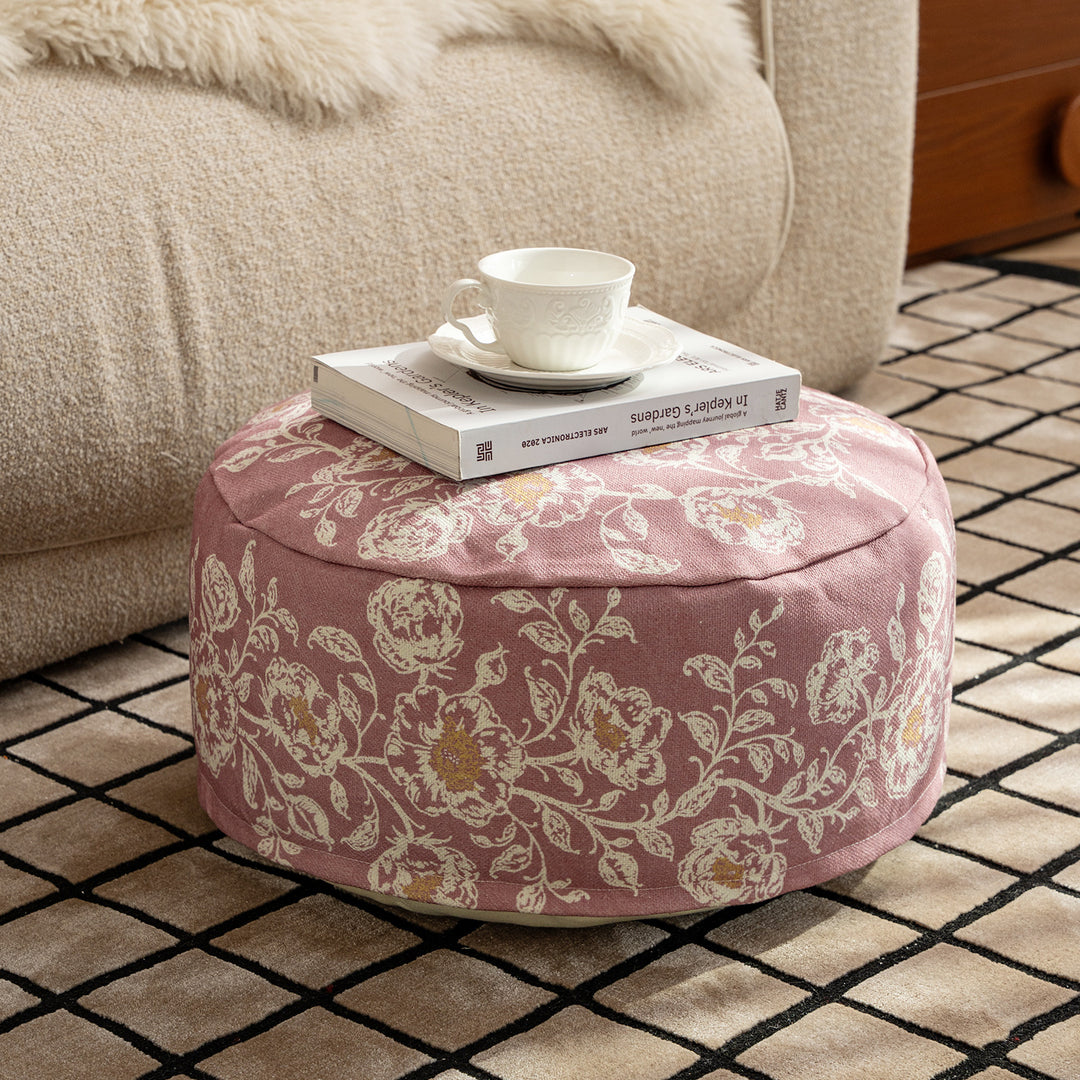 Round seat pouf with floral jacquard weave, stable upholstery core, and carrying handle Kalsten