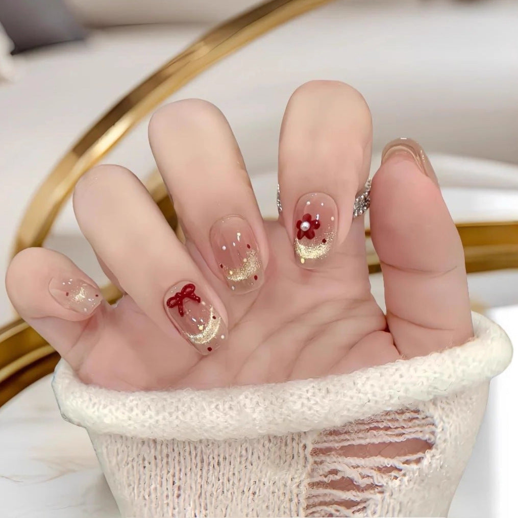Festive artificial nails with delicate Christmas motifs Kalsten