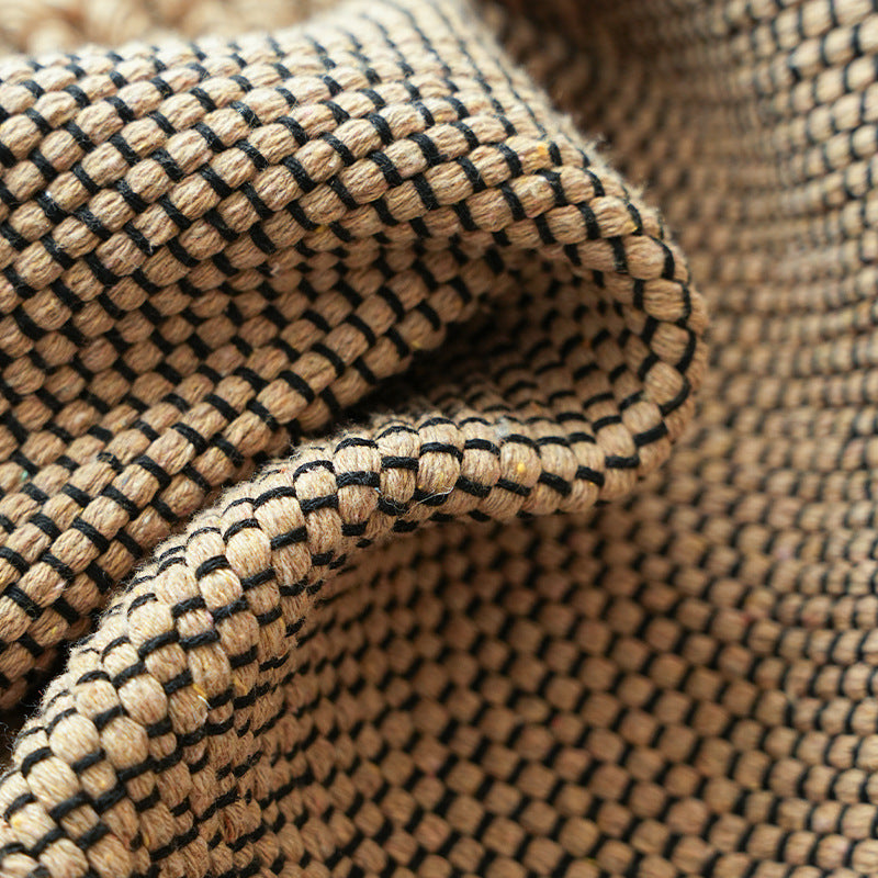 Handwoven structured cushion cover made of cotton blend with pompom trim Kalsten
