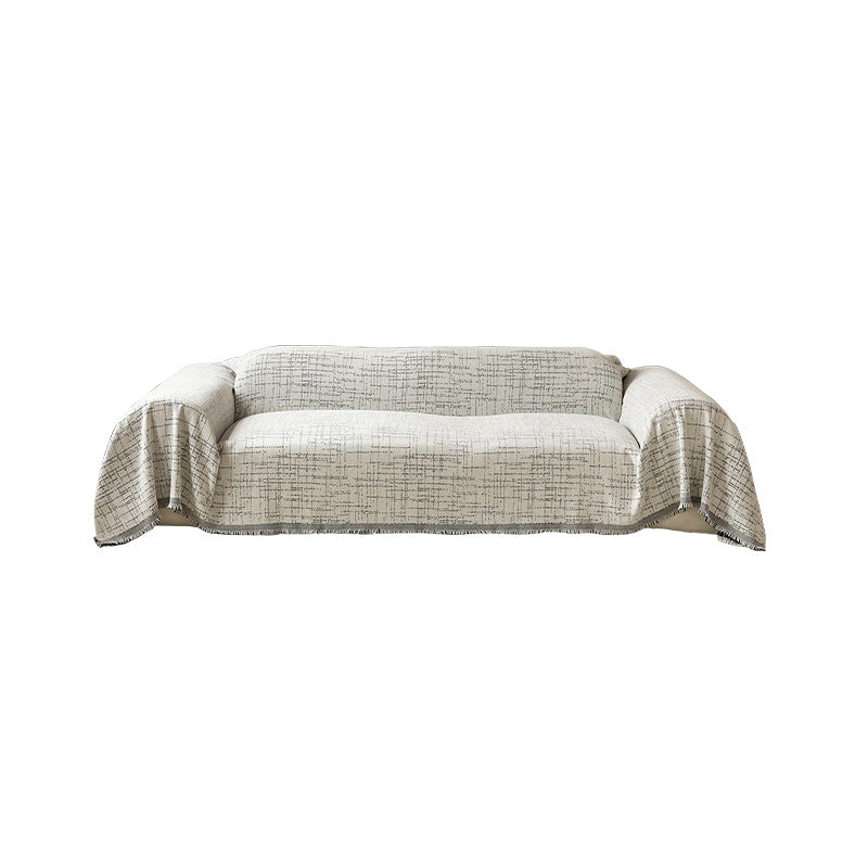 Universal sofa throw made of woven cotton blend with fringes and gentle upholstery cover Kalsten
