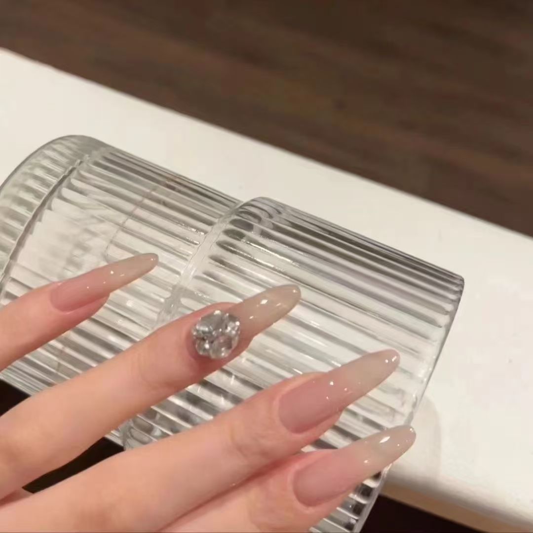 Elegant artificial nails with glitter and crystal accents Kalsten