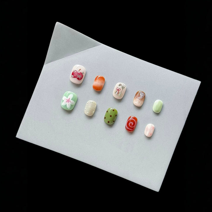 Artistic Press-On Nail Set with Unique Sketch Designs