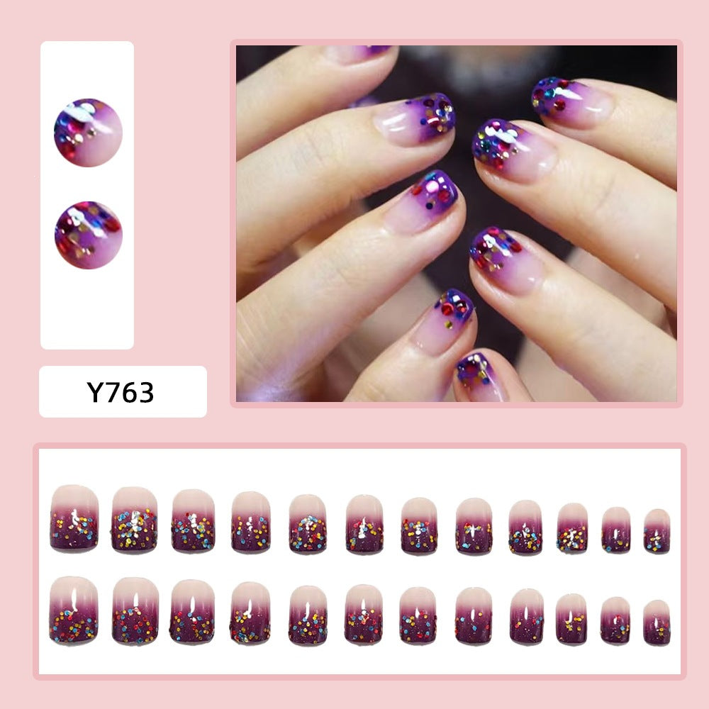 False nails with glamorous glitter design Kalsten