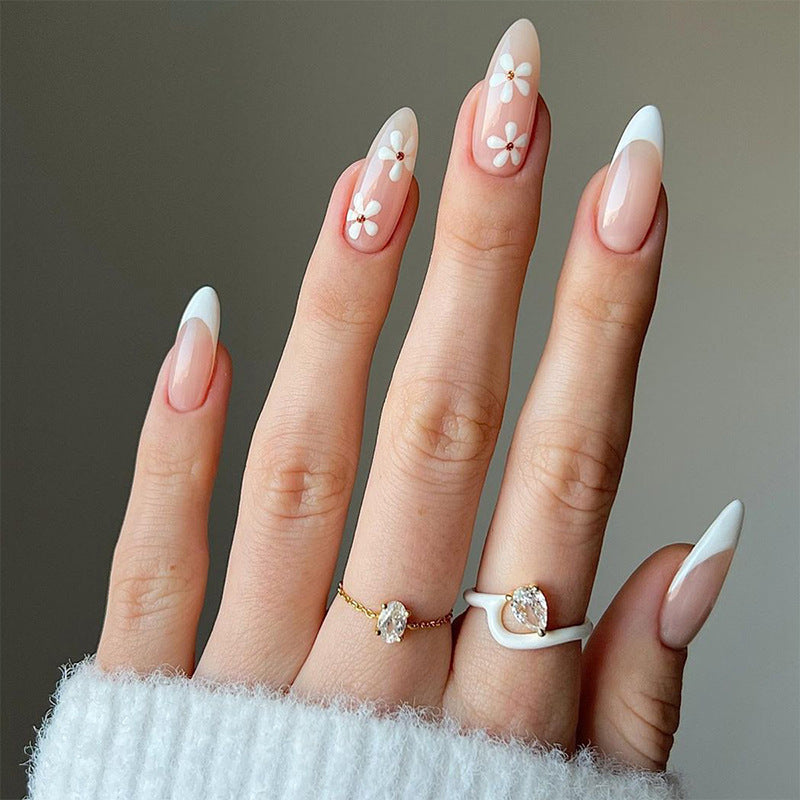 Artful stiletto nails with floral accents Kalsten