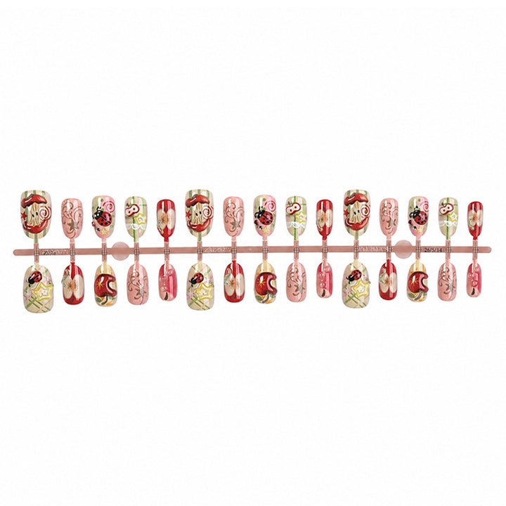 Creative nail art set with playful designs and glitter accents Kalsten