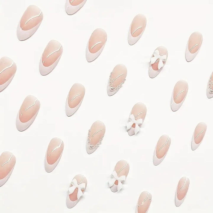 Artistic Press-On Nail Design with Bow Accents Kalsten