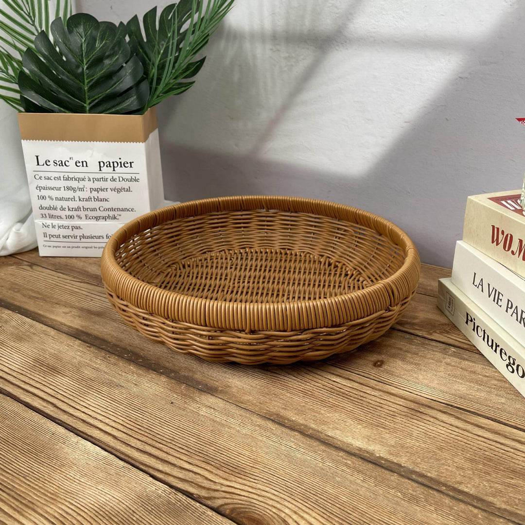 Women’s round serving basket made of woven rattan Kalsten