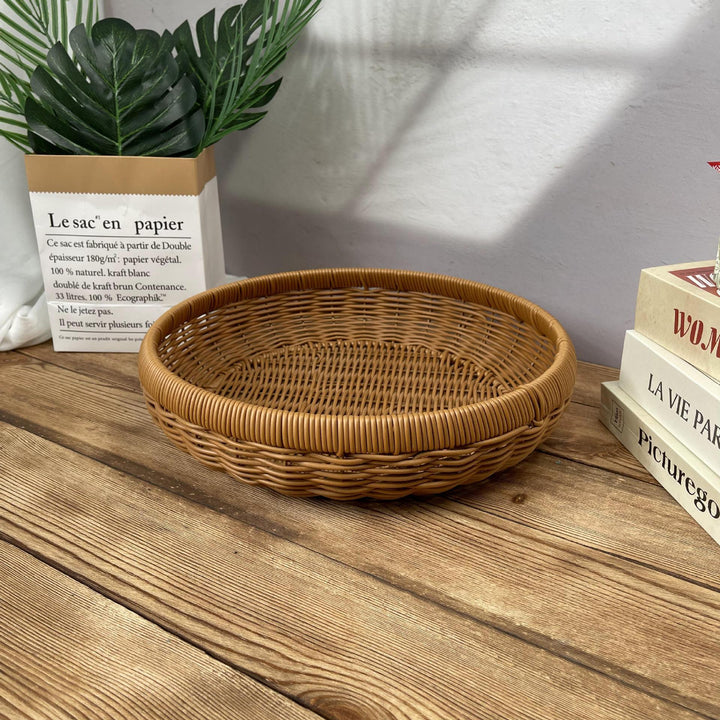 Women’s round serving basket made of woven rattan Kalsten