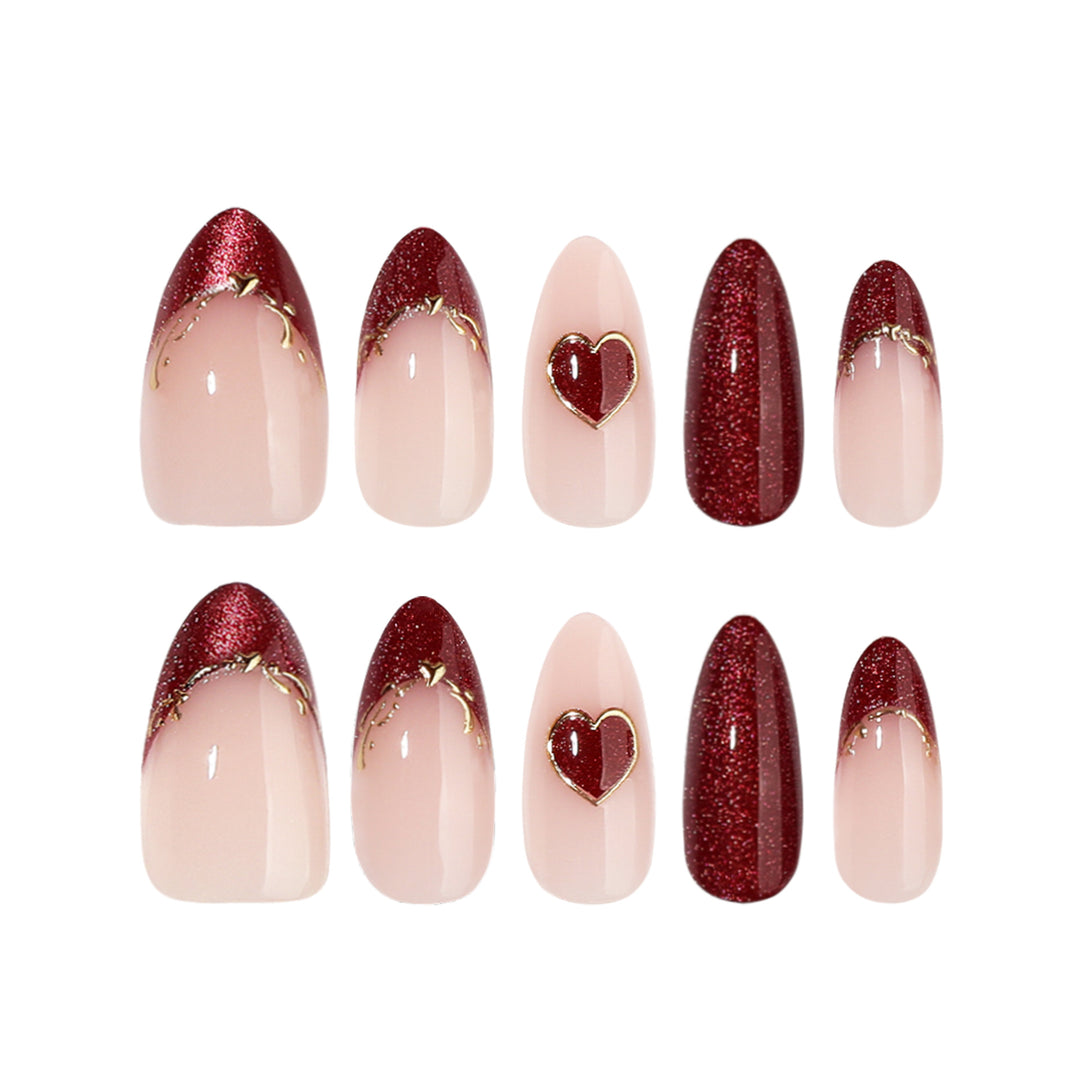 Artful stiletto nails with heart designs and glitter embellishment Kalsten