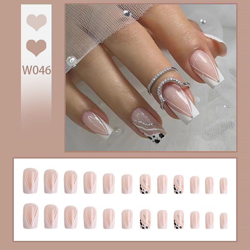 Artificial nails with elegant French design and glitter details Kalsten
