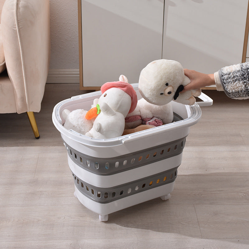 Foldable laundry basket with wheels, ventilation slots and carrying handle