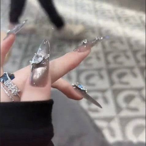 Glamorous artificial nails with rhinestone accents Kalsten