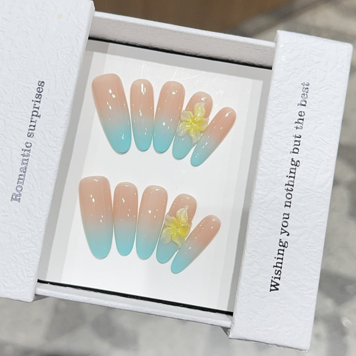 Artificial nails with enchanting ombre effect and floral accents Kalsten