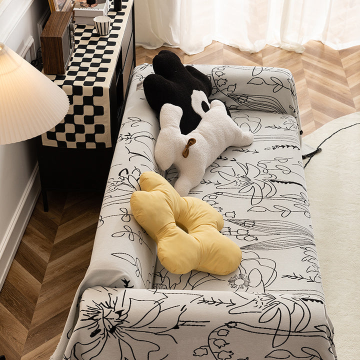 Fine woven sofa cover and furniture throw with floral line drawing and decorative fringed edge Kalsten