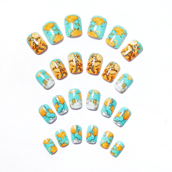 Creative artificial nails with world map inspired design Kalsten