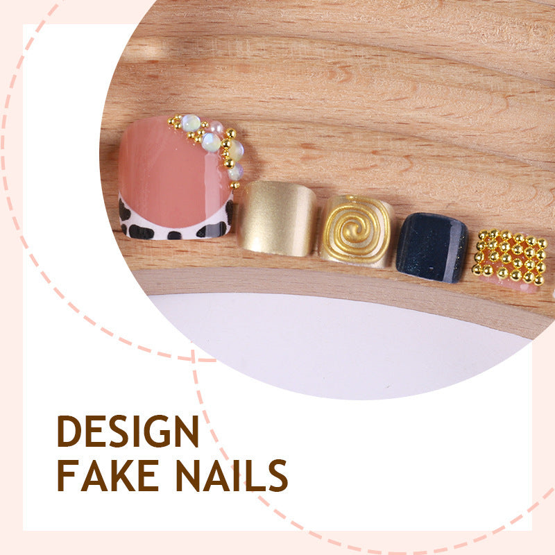 Acrylic nail set with luxurious golden embellishments Kalsten