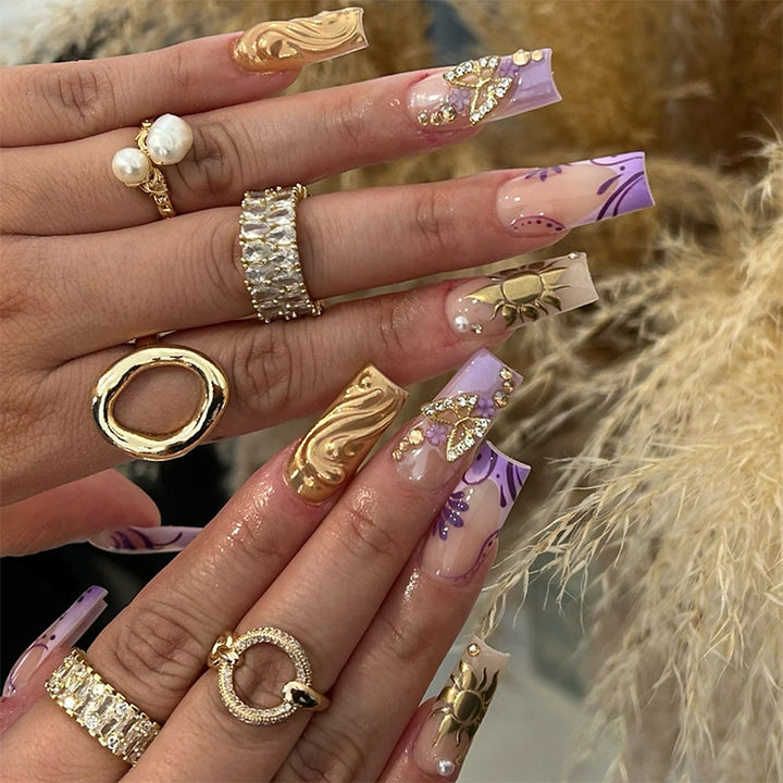 Artificial nail set with delicate flower and glitter accents Kalsten