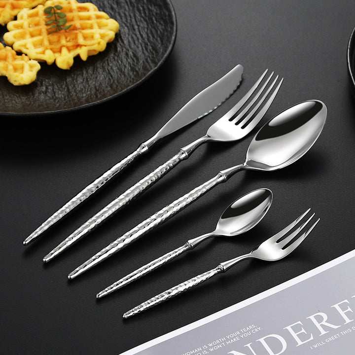 Elegant soup spoon with structured handle Kalsten