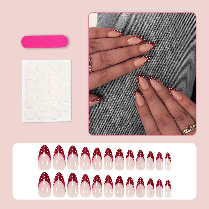 Nail art set with elegant red tips and playful dots Kalsten