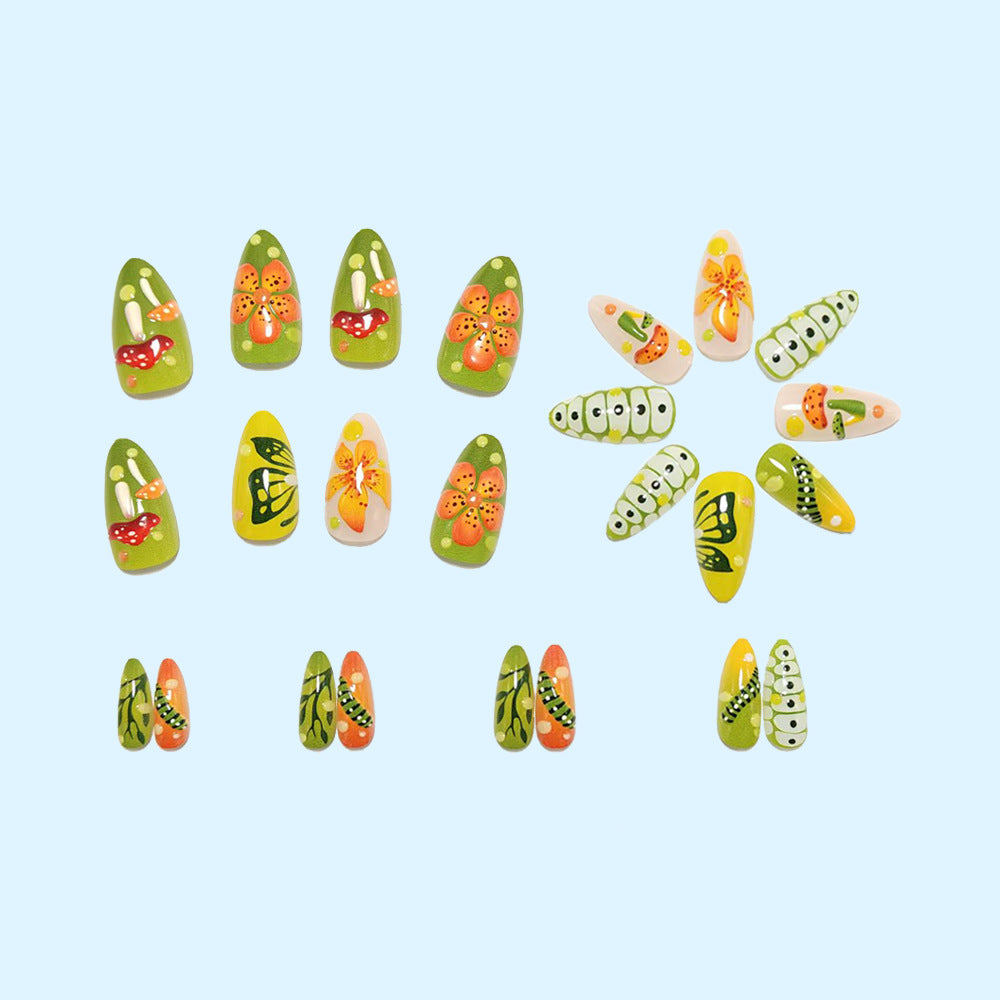 Artificial nails in forest style with floral and mushroom-shaped designs Kalsten